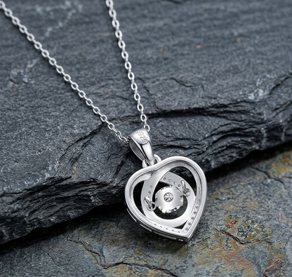 The Lovelace 'Dancing' Moissanite Heart Pendant