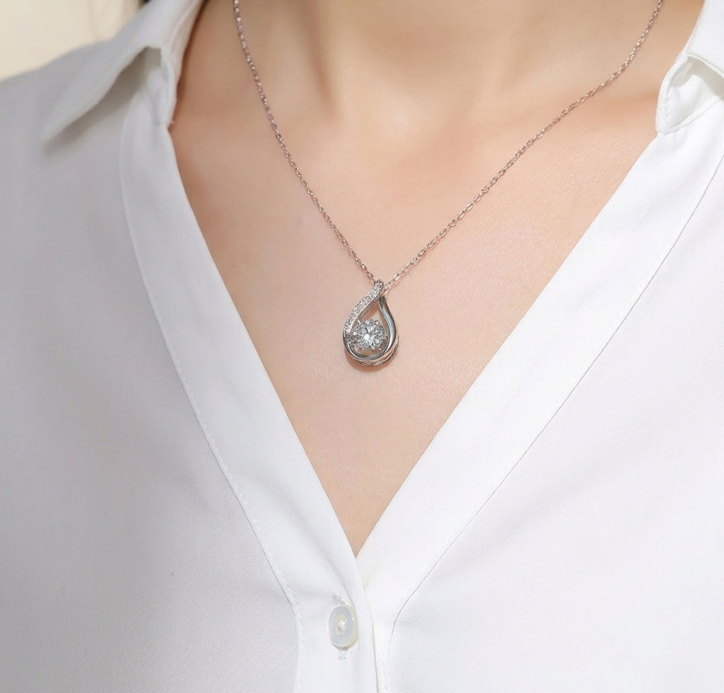The Astraea Teardrop Pendant in Brilliant Moissanite
