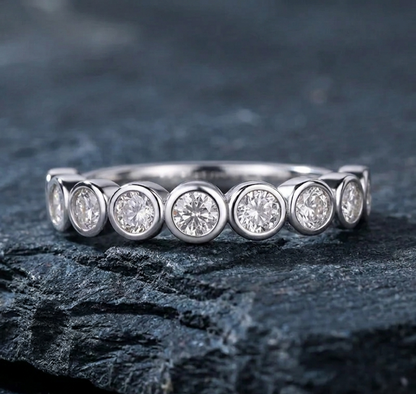 The Seraphina Floating Bezel Moissanite Eternity Ring