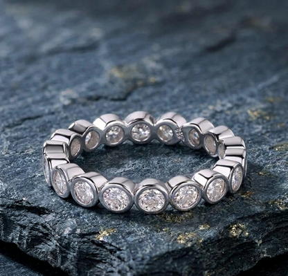 The Seraphina Floating Bezel Moissanite Eternity Ring