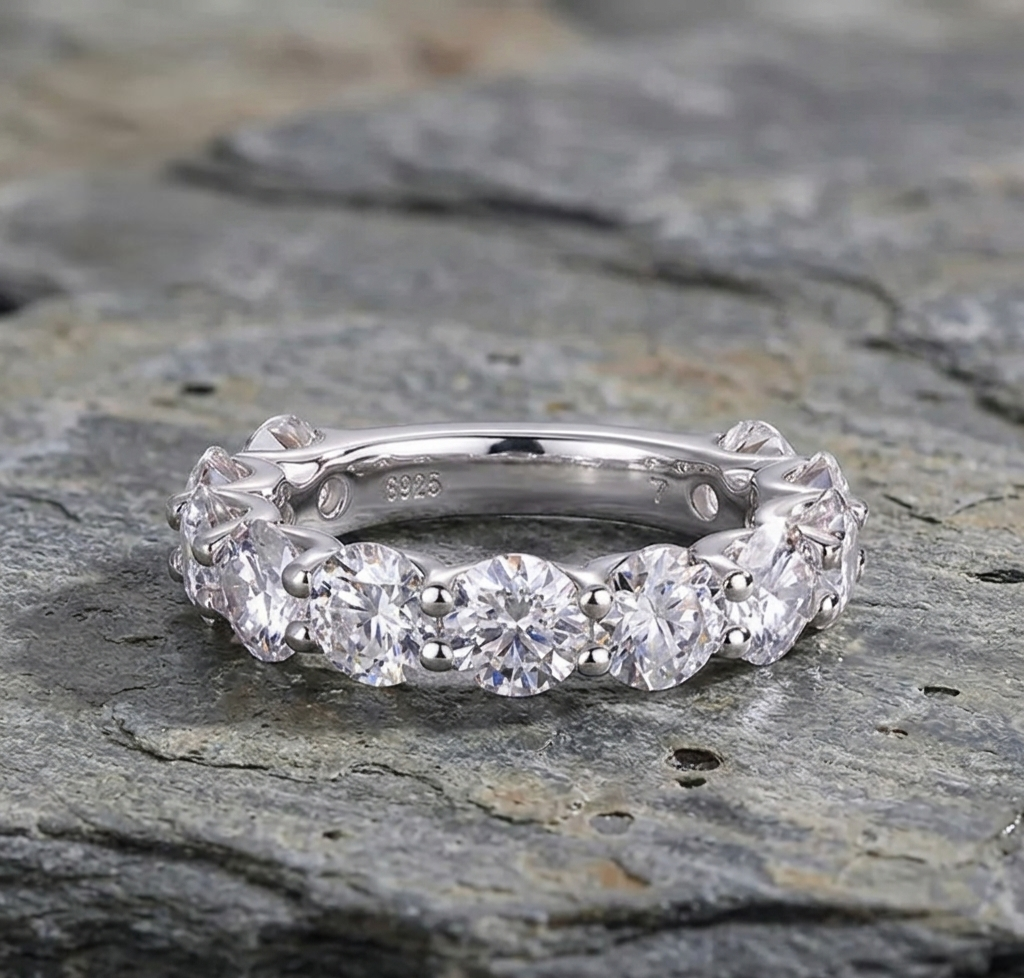 The Cleo Shared-Prong Moissanite Eternity Band