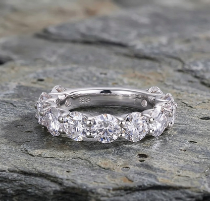 The Cleo Shared-Prong Moissanite Eternity Band