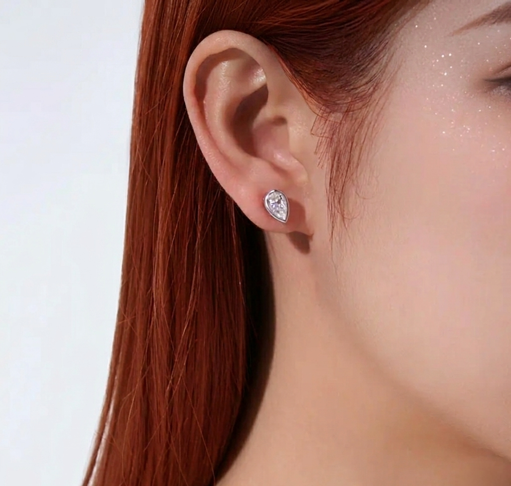 The Aria Pear-Cut Moissanite Bezel Studs