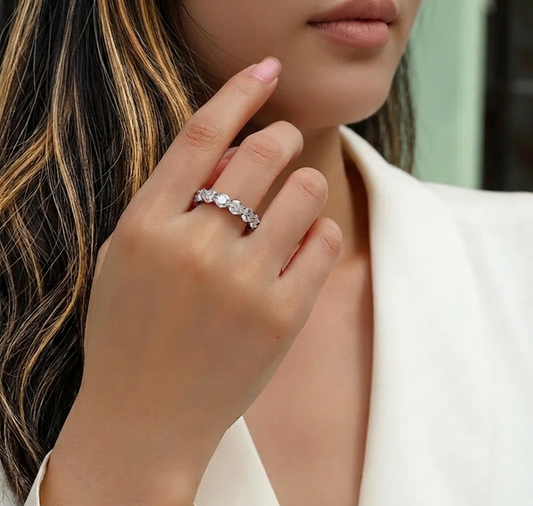 The Cleo Shared-Prong Moissanite Eternity Band